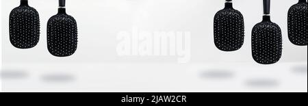 Hair combs isolated. Closeup of a stylish new modern hair brush in two  views. Macro photo of front and rear view. Concept of body and beauty care  Stock Photo - Alamy