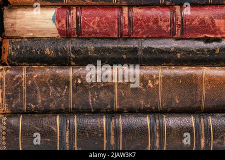 Old books obsolete covers close up for texture and background Stock Photo