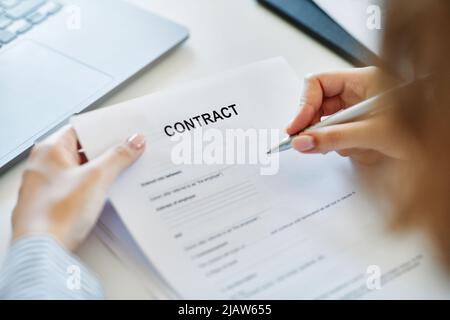 contract business document person pen signing paper agreement office hand signature sign paperwork Stock Photo