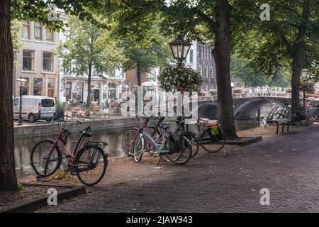 Leiden, Netherlands - July 25, 2021: View of the pleasant center of the student city of Leiden with beautiful old canal houses along the canals. Stock Photo