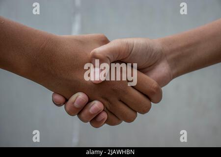 Photo of people shaking hands. Stock Photo