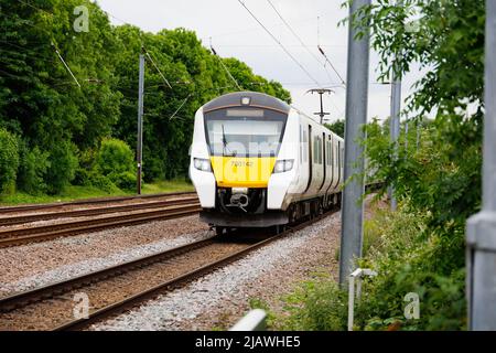 Thameslink Siemens Desiro Class 700 electric train on the East Coast Main Line at Offord Cluny, Cambridgeshire, England Stock Photo