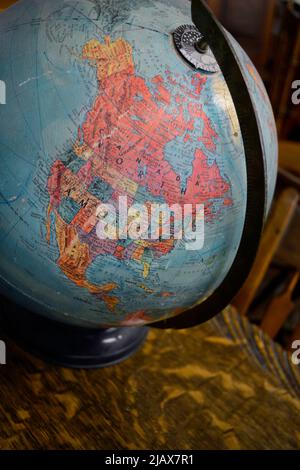 A vintage globe showing North American for sale in an antique shop in Santa Fe, New Mexico. Stock Photo