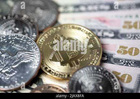 Bitcoin cryptocurrency exchanging to dollar coins and banknotes. Trading with digital assets like Bitcoin. Digital blockchain technology concept. Stock Photo
