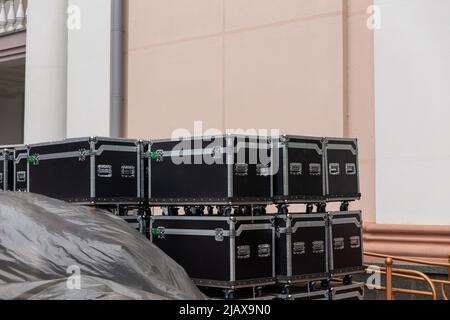 Boxes for musical equipment. Shipping case. Boxes for concert equipment. Organization of parties. Containers on wheels. Technique for concerts. Case f Stock Photo