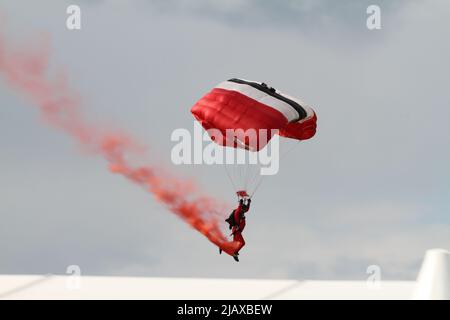 Ipswich, UK. 01st Jun 2022. After being cancelled in 2020 and 2021 due to Covid restrictions the Suffolk Show returns to Ipswich. The Red Devils parachute display team drop into the show. Credit: Eastern Views/Alamy Live News Stock Photo