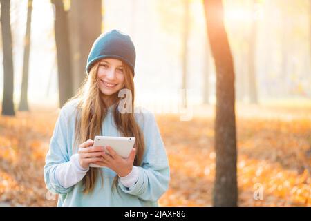 Nice girl holding tablet Stock Photo