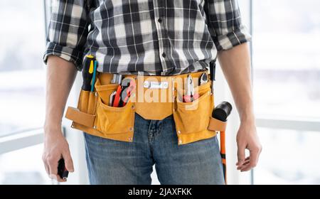 Mounting belt with tools for repair Stock Photo