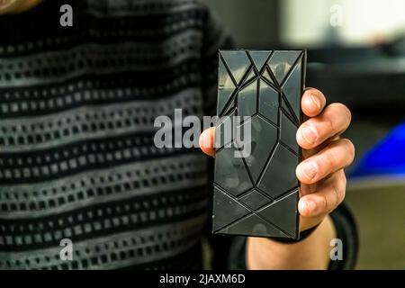 Chocolate bar with typical pattern of Omnom chocolate factory in Reykjavik, Iceland. Stock Photo