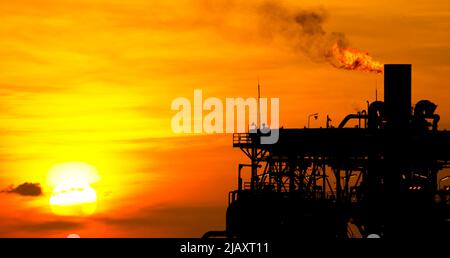 Gas flare and offshore oil platform in the South China Sea Stock Photo