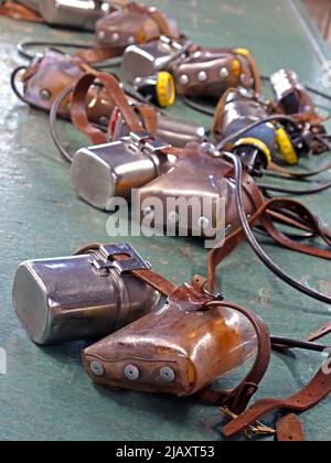 NCB mining lamp and safety belt, colliery lamproom , Blaenavon, Torfaen, Wales, UK Stock Photo