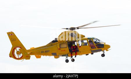 A helicopter for rescue operations and transporting roughnecks to offshore rigs Stock Photo