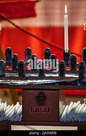 Close up of an offertory prayer in a church in Iglesias Stock Photo