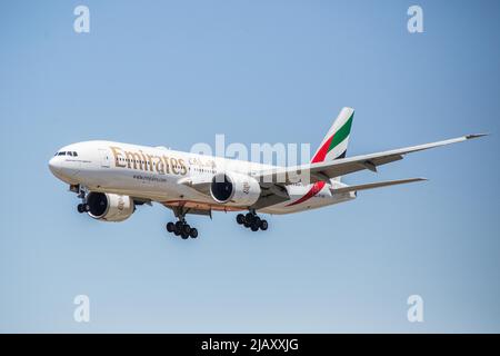 Barcelona, Spain. 31st May, 2022. Emirates Airline, Boeing 777-300ER airplane is seen landing at El Prat Airport. Credit: SOPA Images Limited/Alamy Live News Stock Photo