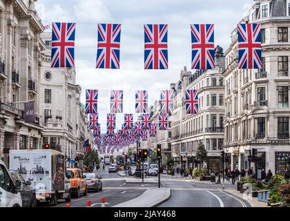 Union Jack flags hang in Regent street, London for the Queen's Platinum Jubilee 2022. Stock Photo