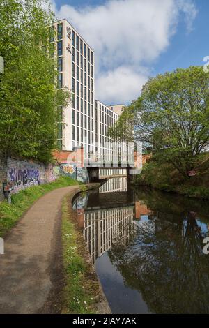 Battery Park offers modern student accommodation and is a short walk away from the University of Birmingham. Here we see it reflected in the canal. Stock Photo