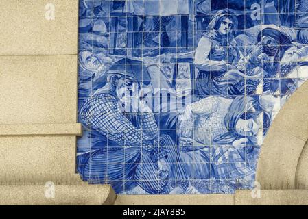 Decorative ceramic tiles azulejos surround the interior of the entrance hall of the railway station in Porto Stock Photo