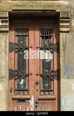 old wooden door with handle in the old town of Porto,  Portugal Stock Photo