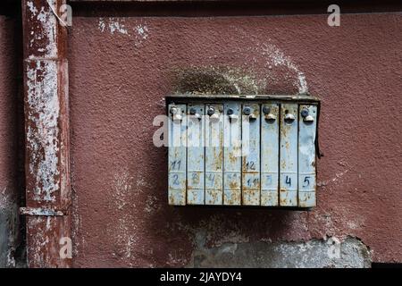 Old rusty soviet mailbox, russian grunge postbox Stock Photo