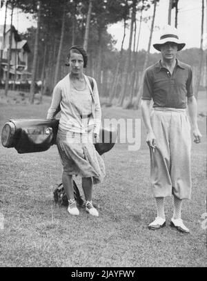 Events in the life of King Edward VIII: A happy pictured of King Edward VIII, then Prince of Wales, in Golfing costume at Biarritz, in August 1931. He is with his little French Caddie, Yvonne. March 9, 1936. (Photo by Associated Press Photo). Stock Photo