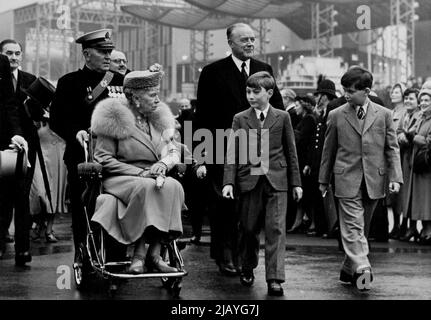 Royal Visit To South Bank Site -- Queen Mary chats with her grandchildren as she visits the Site in her wheel chair today. Prince Michael of Kent, Prince William of Gloucester. The King and Queen together with members of the Royal family today paid an official visit to the South bank Festival Site. May 5, 1951. (Photo by Fox Photos). Stock Photo