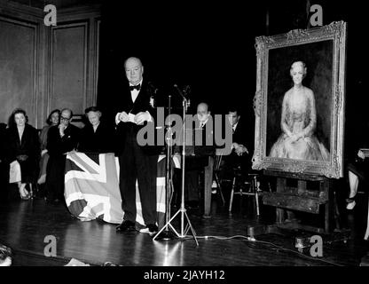 Presentation To Sir Winston Churchill: At the headquarters of the Woodford Conservatives Association to-night Sir Winston Churchill was presented with a portrait in oils of his wife Lady Churchill. It was for his 80th birthday which is on November 30th.....This picture shows him speaking at Woodford to-night after the presentation. November 23, 1954. (Photo by Daily Mail Contract Picture). Stock Photo