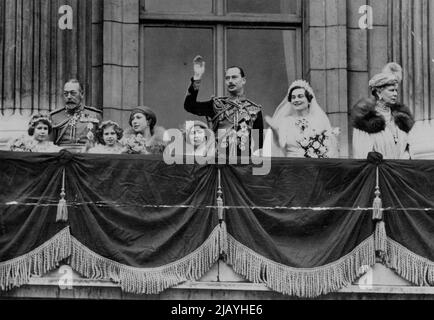 Presents of Exquisite jewelry given by the King and is the joint present of King and Queen. They comprise balcony of Buckingham palace. From left to right Princess Elizabeth ***** Wood, the Duchess of York, the Duke of Gloucester. November 22, 1935. Stock Photo