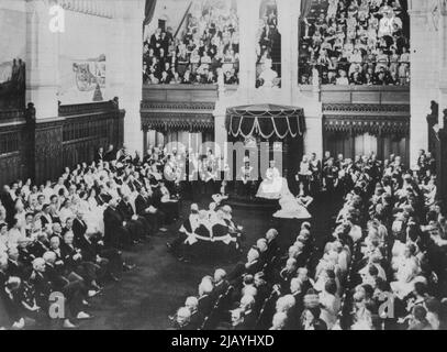 First Original Pictures Of King And Queen In Canada - By Air Across Atlantic -- The Magnificent scene in the Parliament House in Ottawa showing the King And Queen seated on the Thrones, during their visit when his Majesty gave the Royal Assent to several bells. These are the first original Pictures to be received in London of the King and Queen's visit to Ottawa, the Canadian capital, they were flown to Marseilles from America by the new Trans-Atlantic air mail service and reached London by air from Marseilles this morning. May 23, 1939. (Photo by Keystone). Stock Photo