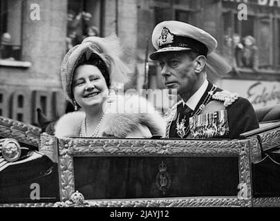 Happy Pair -- The King and Queen drive through fleet street on the way back to Buckingham Palace after the festival service of dedication May 3, at St. Paul's Cathedral. May 09, 1951. (Photo by Associated Press Photo). Stock Photo