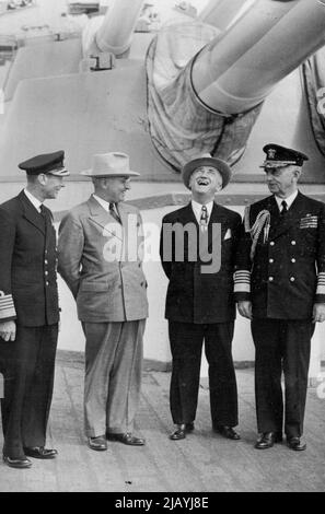 Mr. Attlee Sees The King -- The King chatting to Mr. Attlee in the grounds of the place this morning July 28. The New Prime Minister, Mr. Attlee, saw His Majesty The King this morning, July 28, he submitted to His Majesty the list of the new government. August 20, 1945. (Photo by Associated Press Photo). Stock Photo