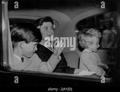 Royal Children Return To London -- Prince Charles and Princess Anne, sitting with Nurse Lightbody, drive from Euston Station to Buckingham Palace following their return to London this morning from Balmoral where they have been spending a holiday with the Queen and the Duke of Edinburgh. The Queen returned to London yesterday. June 01, 1954. Stock Photo