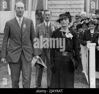 Duchess Of Gloucester Visits Highland Show: The Duchess accompanied from the Royal Box by her brother, the Duke of Buccleuch. The Duchess of Gloucester yesterday visited the Highland Show at Melrose, Roxburghshire, where she was received by her brother, the Duke of Buccleuch, President of the Society. June 25, 1936. (Photo by Topical Press). Stock Photo