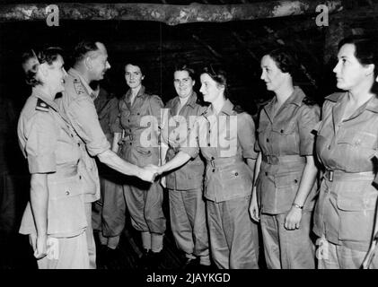 Duke of Gloucester's tour of forward areas -- HRH, the Duke of Gloucester visits the sister's Mess at the Australian General Hospital, Jacquinot Bay. Here he is greeting Sister L. D. Wade, of South Australia. July 23, 1945. Stock Photo