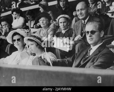 Closing scenes at Wembley Stadium - The Duchess of Kent (left) and her daughter Princess Alexandra, with the Duke of Edinburgh (right foreground) in the royal box watching the prix des nations at the Wembley stadium, today Aug. 14. At right background is Lewis Douglas, US Ambassador in London and his wife (in dark frock with light coloured hat). September 21, 1948. (Photo by Rota Picture) Stock Photo