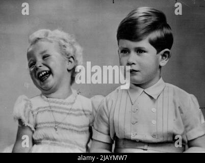 Prince Charles Is Four Today -- This Charming study of Prince Charles with Princess Anne was made to Commemorate his fourth birthday anniversary. November 26, 1952. (Photo by Associated Press Photo). Stock Photo