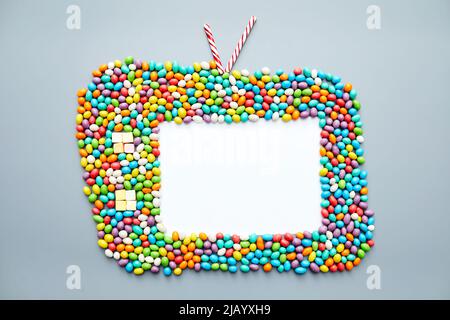 Old-fashioned television set made of candies such as jellybeans, candy canes, marshmallows Stock Photo