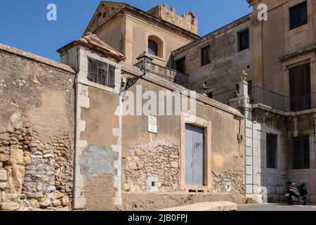 Tarragona, Spain. 28th May, 2022. View of the façade the Archdiocese of Tarragona from the street Pla de Palau. The old city of Tarragona, protected by Roman walls, has kept its medieval aesthetics. The old buildings are being restored to preserve the style of the time and become an essential visit for tourists. The summer of 2022 has seen a very important number of reservations and the doubling of the capacity of cruise ships in the port of Tarragona. Credit: SOPA Images Limited/Alamy Live News Stock Photo