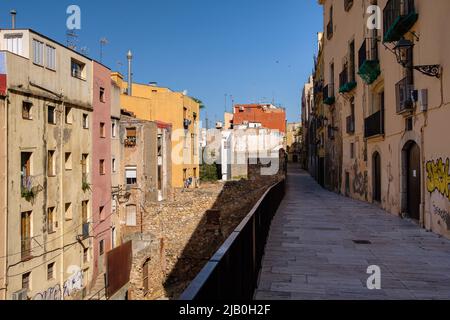 Tarragona, Spain. 28th May, 2022. Old buildings in the medieval old town of Tarragona. The old city of Tarragona, protected by Roman walls, has kept its medieval aesthetics. The old buildings are being restored to preserve the style of the time and become an essential visit for tourists. The summer of 2022 has seen a very important number of reservations and the doubling of the capacity of cruise ships in the port of Tarragona. (Photo by Laurent Coust/SOPA Images/Sipa USA) Credit: Sipa USA/Alamy Live News Stock Photo