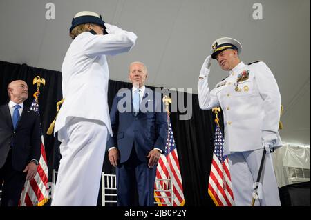 United States President Joe Biden and US Secretary of Homeland Security Alejandro Mayorkas, left, watch as outgoing Commandant Admiral Karl L. Schultz, right, salutes incoming Commandant Admiral Linda Fagan in a change of command ceremony at US Coast Guard Headquarters in Washington, DC on Wednesday, June 1, 2022. Credit: Bonnie Cash/Pool via CNP Stock Photo