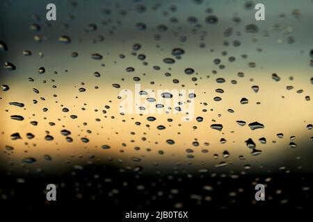 The water drops on the windshield on a rainy day Stock Photo