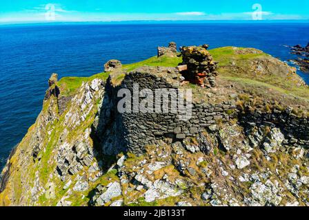 Aerial view from drone of ruin of Fast Castle on clifftop in Berwickshire, Scottish Borders, Scotland, UK Stock Photo