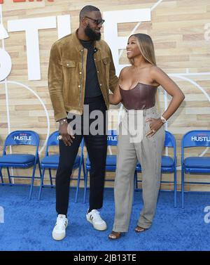 (L-R) LeBron James and Savannah James arrives at Netflix's HUSTLE Los ...