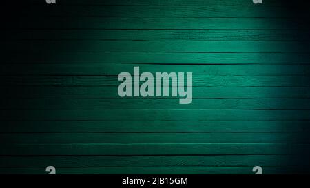 Green painted wooden wall. Panoramic old green background and texture. For graphic design and banner Stock Photo
