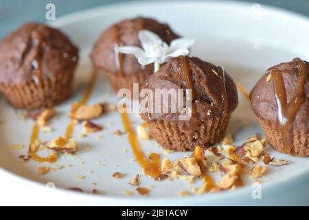 Close-up banana cupcake. set of cupcakes, Muffins on a white plate. selected focus Stock Photo