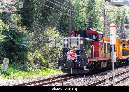 Sagano Romantic Train. It runs on 25 min route from Saga torokko station to Kameoka torokko Station, scenic beauty of Hozukyo Ravine on its route Stock Photo