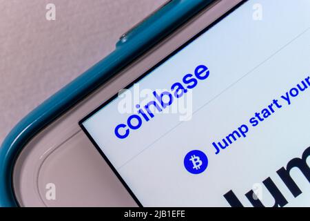 Kumamoto, JAPAN - Apr 22 2021 : Cryptocurrency platform Coinbase logo on iPhone. On 2021, It went public on Nasdaq exchange via a direct listing Stock Photo