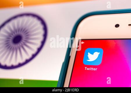 Kumamoto, JAPAN - May 3 2021 : Twitter on iPhone on Indian flag. India is the world's 3rd largest Twitter market with over 19 million users in 2020 Stock Photo