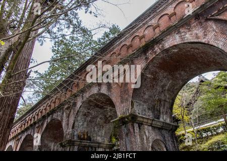 Suirokaku, famous aqueduct built in 1890 at Nanzenji Temple complex, in cloudy day. From the Meiji Period, it brings water from Lake Biwa to Kyoto Stock Photo