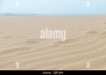 Closeup Ripple marks on Sand Dunes. In geology, ripple marks are sedimentary structures and indicate agitation by water (current or waves) or, wind Stock Photo