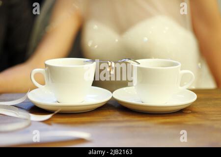 Coffee time, coffee break. Wedding day. Couple in cafe Stock Photo